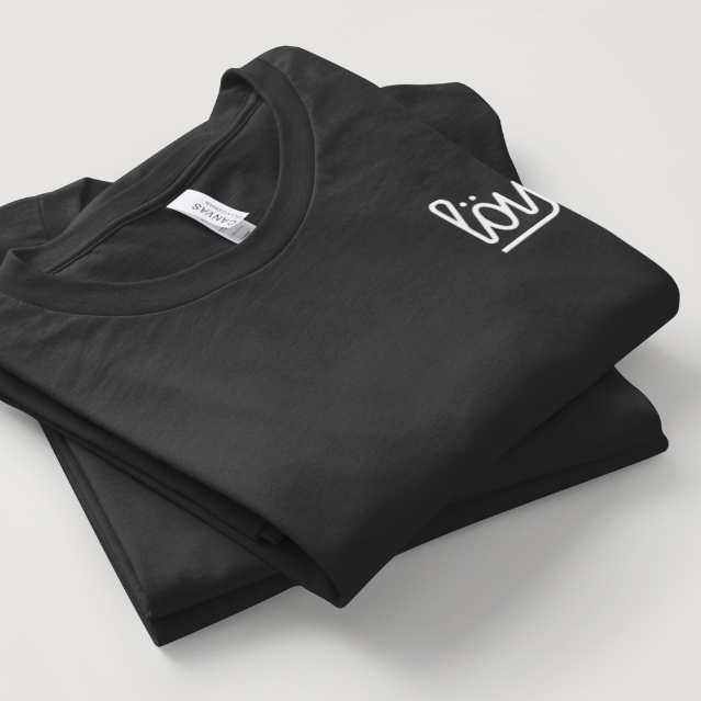 A folded black crewneck t-shirt with a white stylized 'loco' logo on the left chest, displayed on a light gray background.